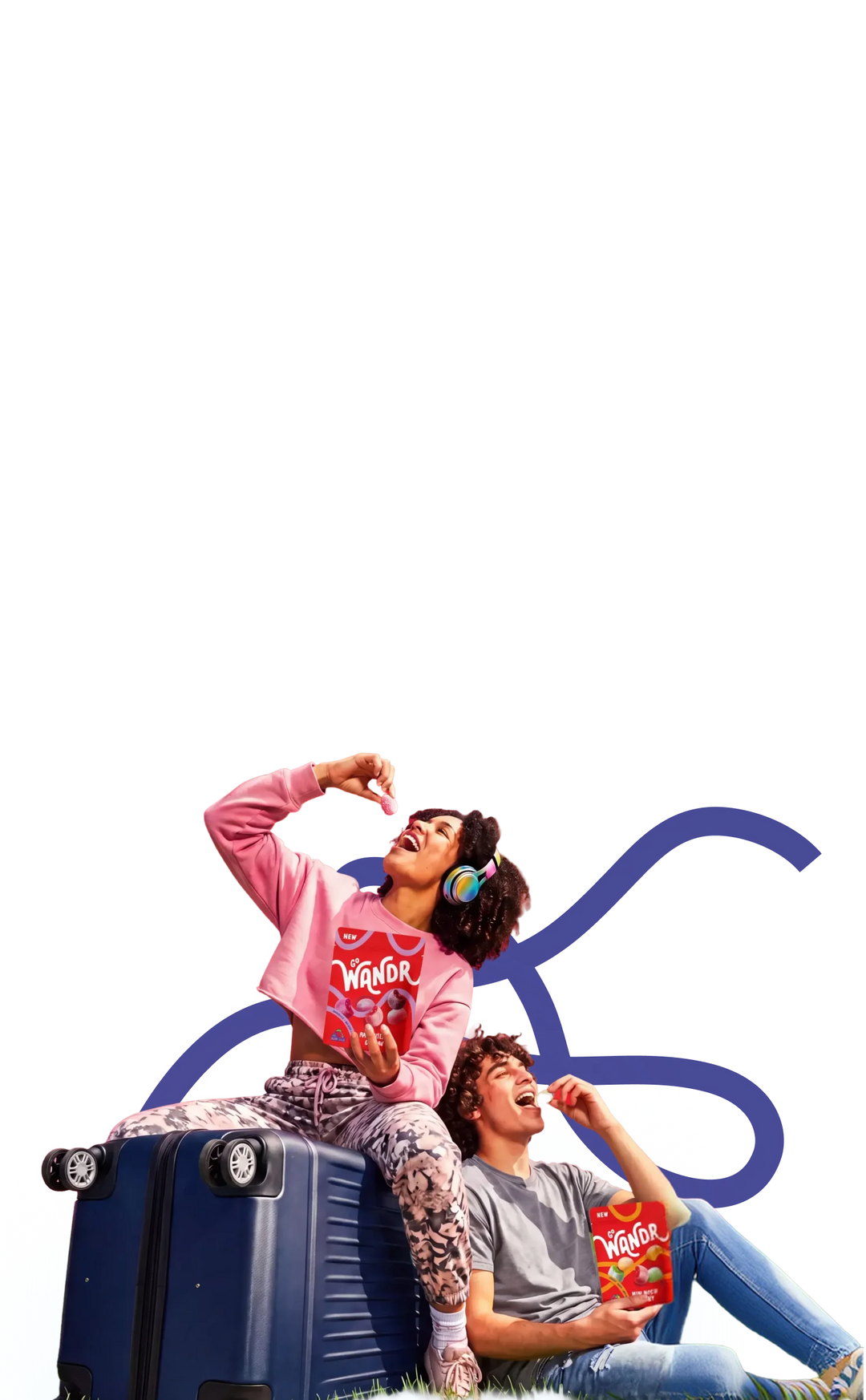 Two young people sitting on a blue suitcase against a white background with a large blue logo. The person on top wears a pink cropped hoodie with a large 'Wagoneer' graphic and headphones, while the person below wears a gray t-shirt and jeans and holds Go Wandr mini mochi gummies.
